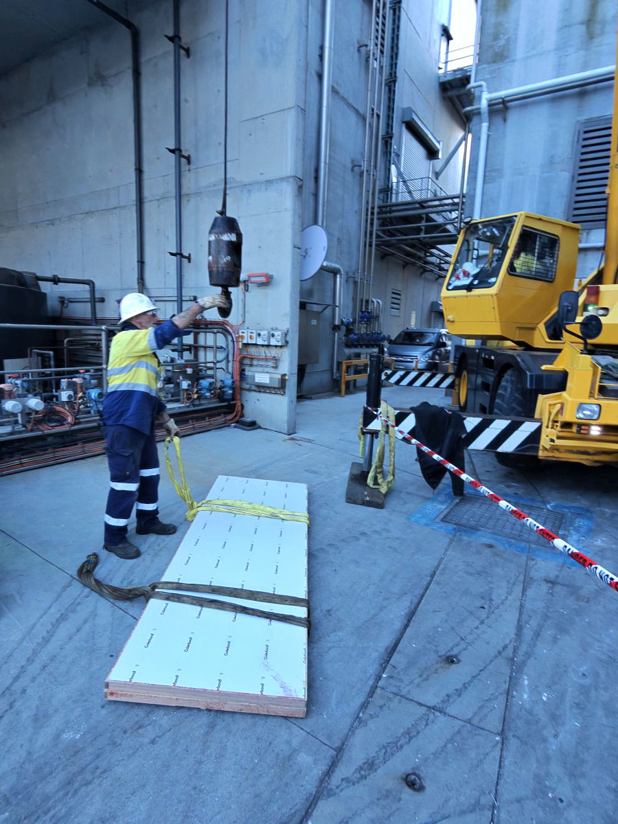 Craning a fire door into place on a commercial site
